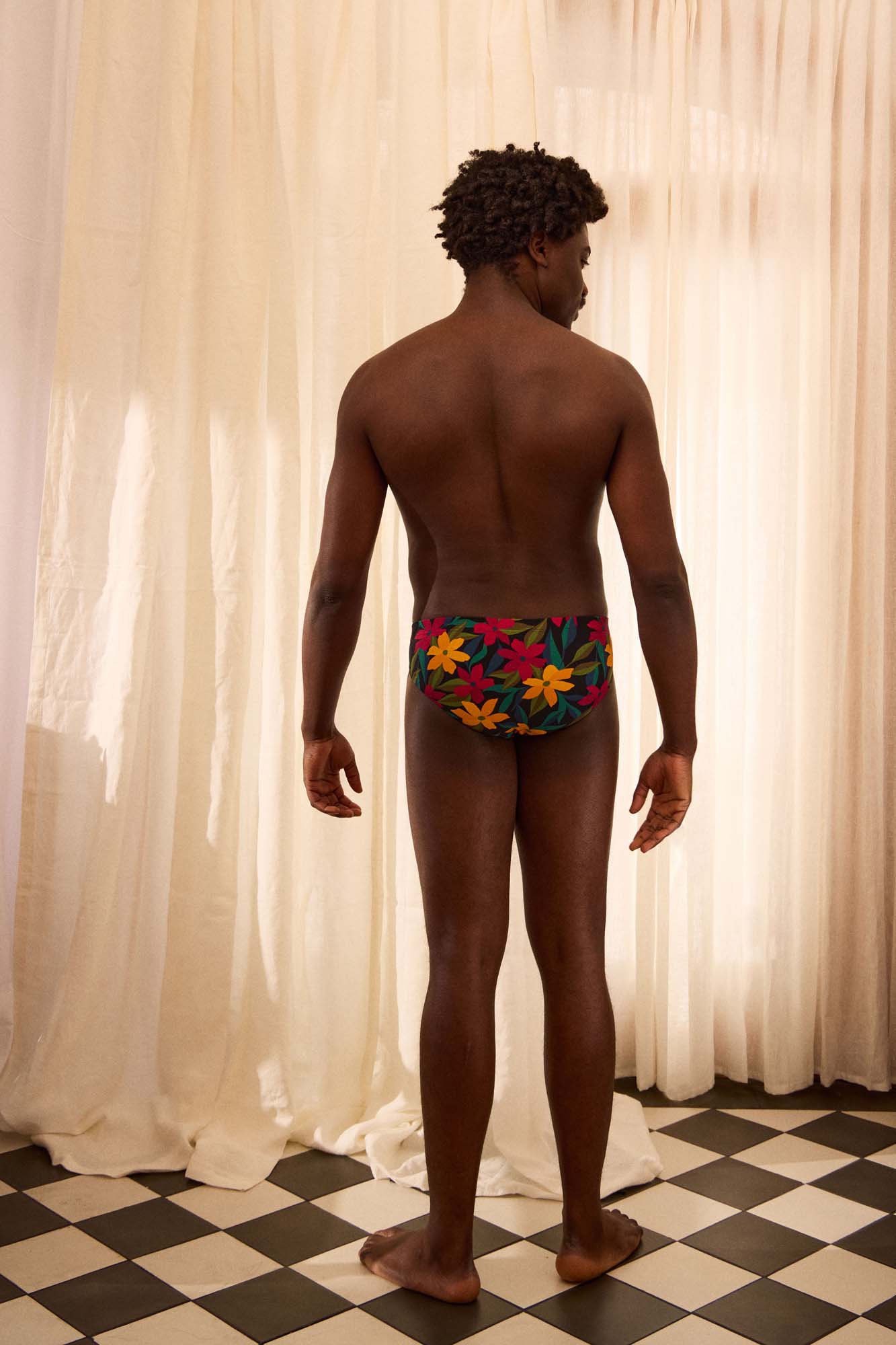 The Slip-on Swim Brief in Night Floral